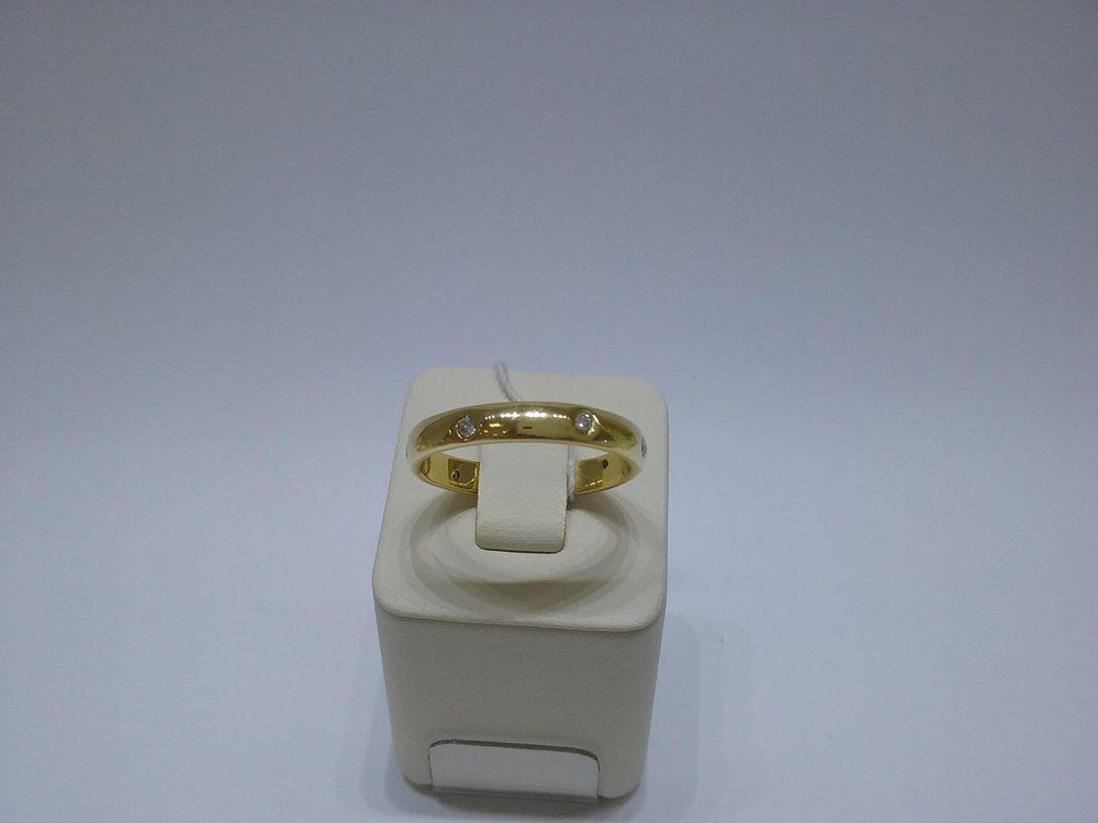 Кольцо обручальное с бриллиантами из желтого золота 750 пробы