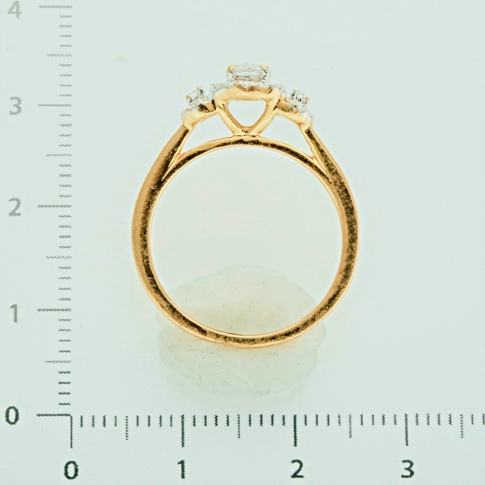 Кольцо с бриллиантом из комбинированного золота 750 пробы