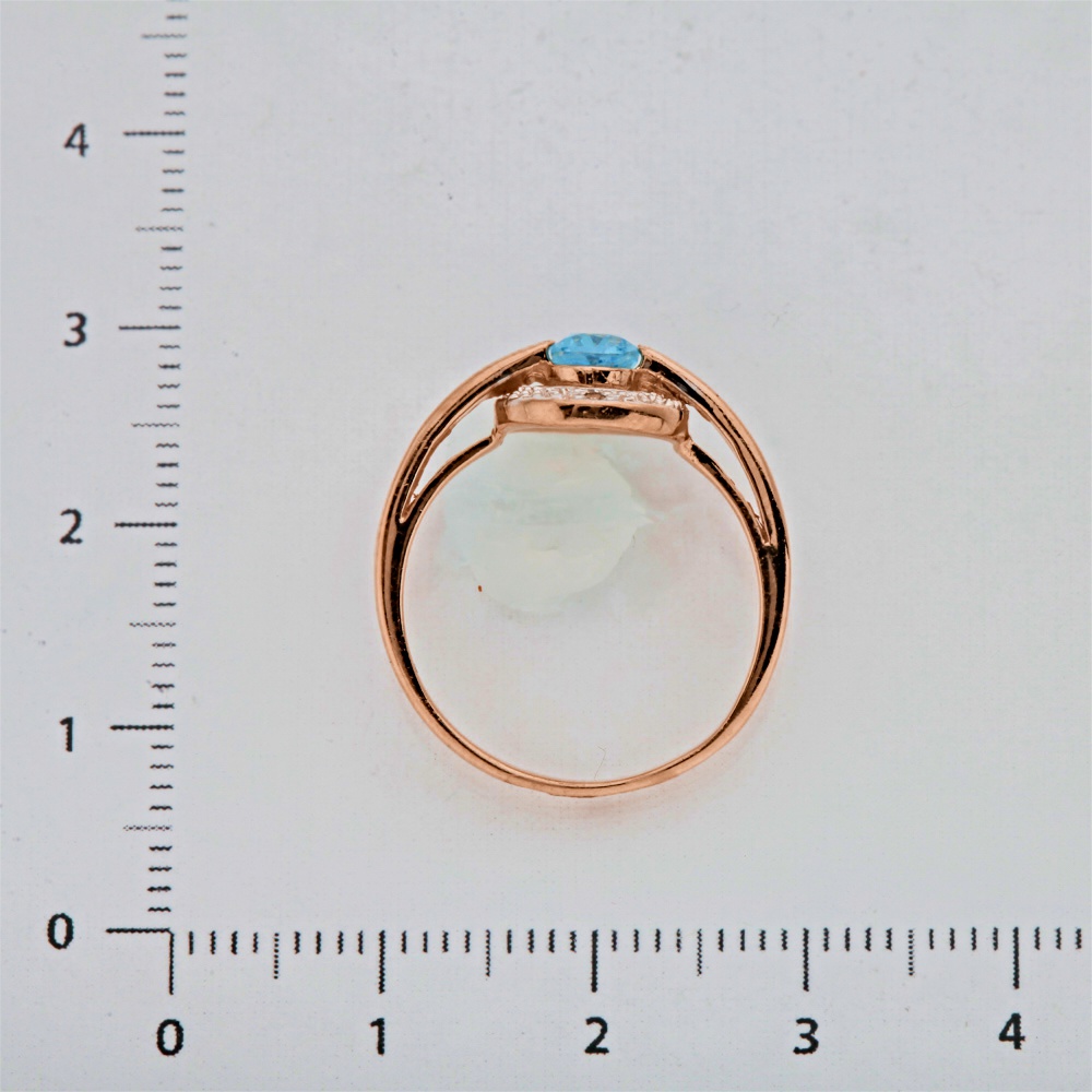 Кольцо с топазом из комбинированного золота 585 пробы