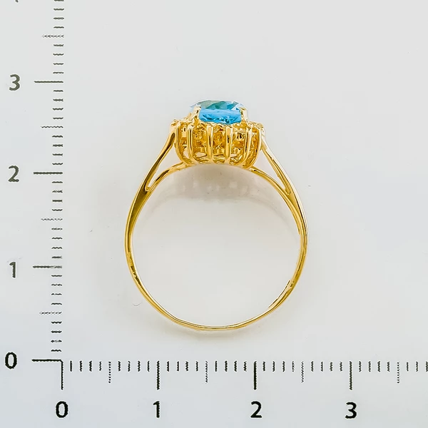 Кольцо с топазом из желтого золота 750 пробы